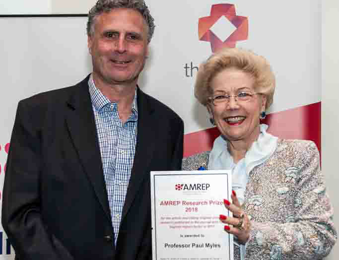 Professor Andrew Forbes - receiving 2018 AMREP Research Prize for Clinical Research on behalf of Professor Paul Myles, presented by Dr Susan Alberti.