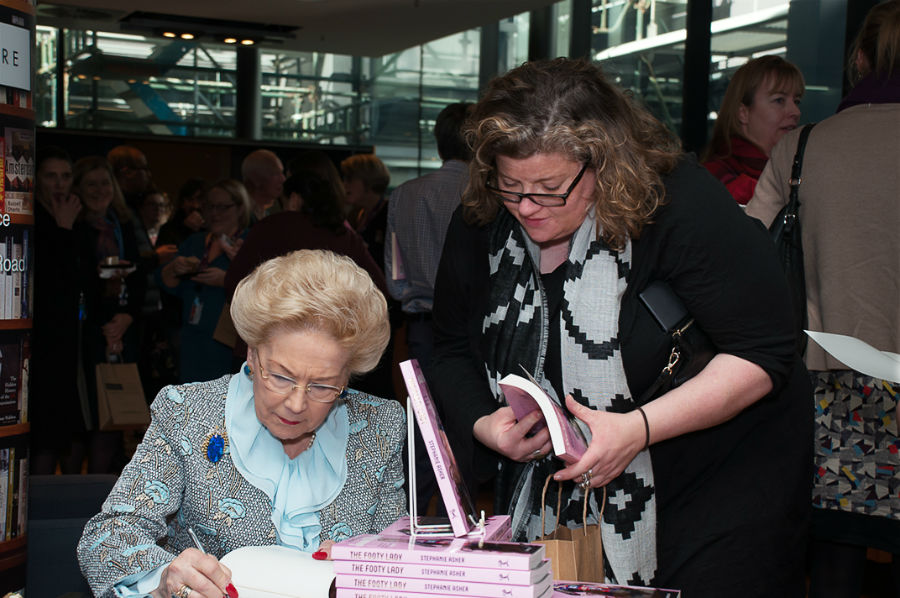 Dr Susan Alberti, AC, signs copies of her autobiography at the 2018 Alfred Health Week Research Day Keynote Address