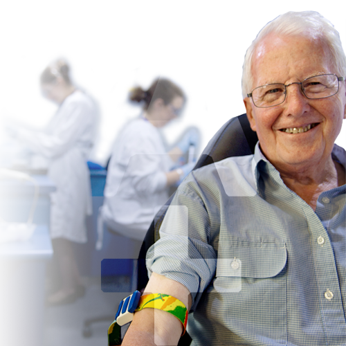 Elderly in lab smiling